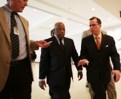 Rep. John Lewis, D-Ga., is questioned by reporters about an ...