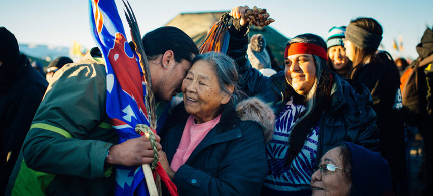Protesters celebrated after learning that the Army said it would not allow an oil pipeline to be drilled near the Standing Rock Sioux reservation. (photo: Alyssa Schukar/NYT)