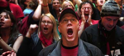 Demonstrators protest in a hallway below the assembly chamber where Wisconsin Governor Scott Walker was delivering his budget address to a joint session of the legislature at the capitol in Madison, Wisconsin, 03/02/11. (photo: Getty Images)