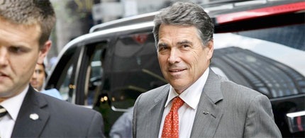 Texas Gov. Rick Perry on the presidential campaign trail, 09/18/11. (photo: Craig Ruttle/AP)