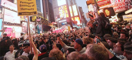 Huge crowds of Wall Street protesters marched north to a boisterous rally in New York's Times Square, 10/15/11. (photo: Getty Images)