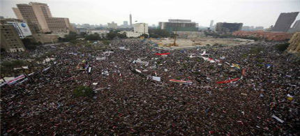 Over 50,000 Egyptian protesters flocked to Cairo's Tahrir square Friday to protest lack of military oversight, pressuring the military government to transfer power. (photo: Mohamed Abd El-Ghany/Reuters)