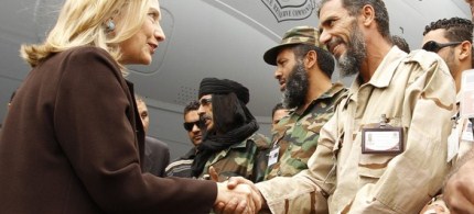 US Secretary of State Hillary Clinton arrives in Libya to meet the new leaders who were helped into power by Washington, 10/18/11. (photo: Reuters)