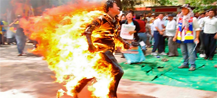 Tibetan exile, Jamphel Yeshi, set himself on fire during a protest against the upcoming visit of Chinese President Hu Jintao to India. (photo: Stringer/Reuters)