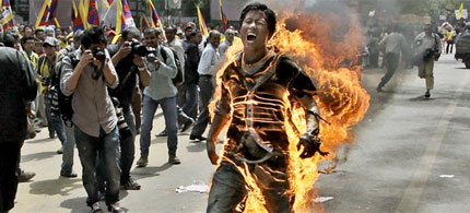 Tibetan exile Jamphel Yeshi set himself on fire during a protest against an upcoming visit of Chinese President Hu Jintao to India. (photo: Manish Swarup)