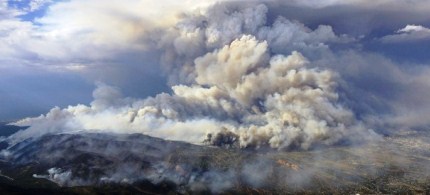 Smoke rises from the Waldo Canyon wildfire in Colorado Springs, Colorado, 06/27/12. (photo: Reuters)