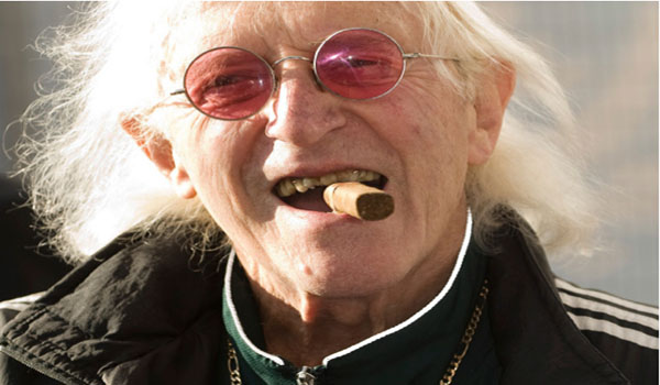 Jimmy Savile Was Part of Satanic Ring; Other BBC Star Stuart Hall Charged with Sexual Abuse on Children