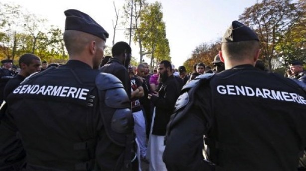 Protesters clash with French Gendarmerie near the US embassy in Paris on September 15,during a demonstration against the anti-Islam film produced in the United States via AFP
