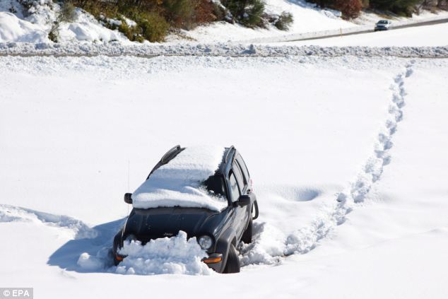 AWOL: A car that went off the road sits abandoned on Interstate 91 in Bernardston, Massachusetts
