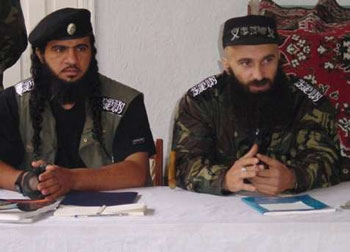 Chechen rebel leaders Shamil Basayev and Al Khattab