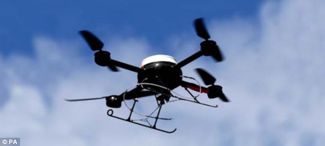Hackers have proved that it is possible to steal information, including Amazon passwords, bank details and even home addresses from smartphones that have Wi-Fi turned on, using specially adapted drones (a stock image of a quadcopter is pictured)