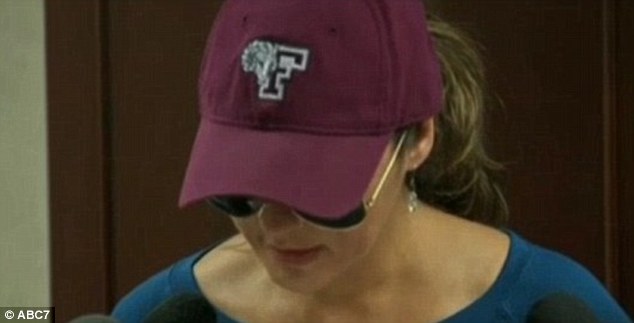 Furious: The mother of an alleged victim, wearing a hat and sunglasses to protect her child's anonymity, said she expected coaches to have kept her child safe