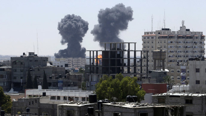 Smoke and flames are seen following what witnesses said were Israeli air strikes in Rafah in the southern Gaza Strip August 1, 2014. (Reuters/Ibraheem Abu Mustafa)