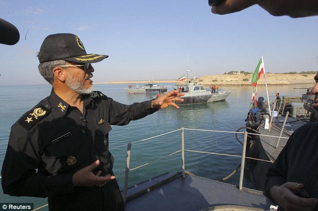 Gestures: Iran's army navy commander Habibollah Sayyari spoke to reporters during the Velayat-90 war game on the Sea of Oman near the Strait of Hormuz