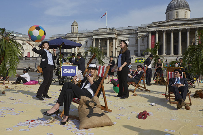 London's Trafalgar Square transformed into an interactive, tropical tax haven by Oxfam, Action Aid and Christian Aid. /
