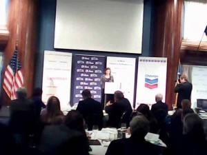 A screen shot of U.S. Assistant Secretary of State for European Affairs Victoria Nuland speaking to U.S. and Ukrainian business leaders on Dec. 13, 2013, at an event sponsored by Chevron, with its logo to Nulands left.