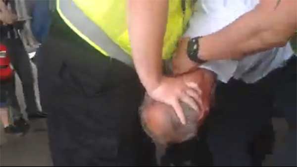 A still from video footage shows Tony Nuttall being arrested