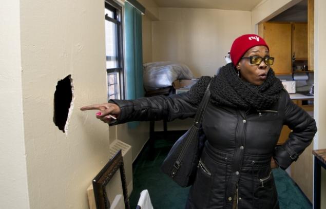 NYCHA SANDY EVICTIONS: Sandra Patton, a resident of 2926 W25th street was served with eviction papers four days after HUrricane Sandy hit.  She has a list of repairs that have never been completed by NYCHA.  (Joe Marino for New York Daily News )