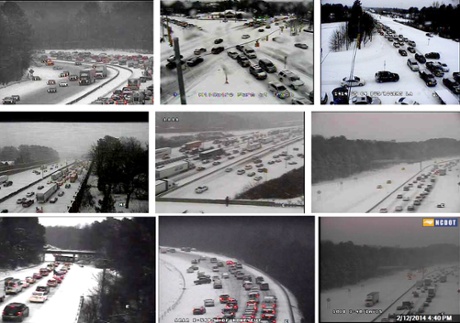 Nine still frames from the North Carolina Department of Transportation (NCDOT) traffic cameras show the difficulties drivers from the town of Raleigh, North Carolina, face February 12, 2014 during a snow storm that hit the US East Coast.