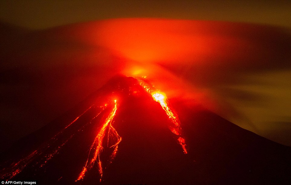 Fire mountain: The Colima Volcano in western Mexico, is pictured as it erupts on Sunday after hundreds of villagers had to be evacuated
